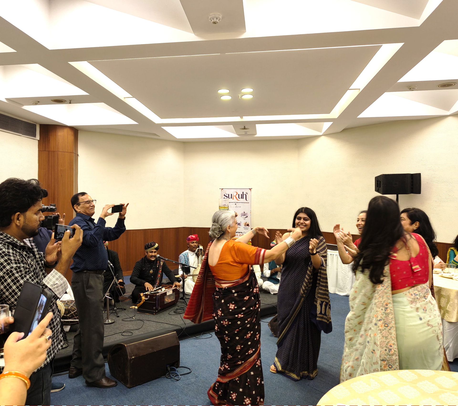 SURUH performance photo 10 — audience enjoying a performance
