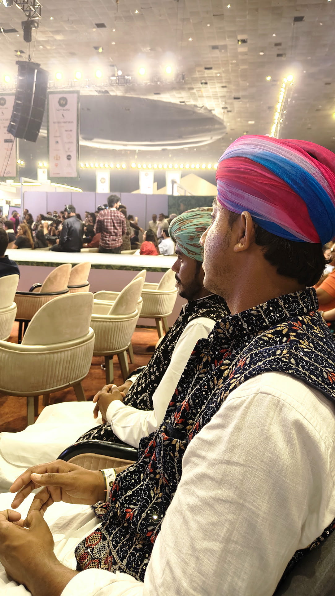 SURUH performance photo 6 — seated musician at an event